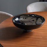 IN-BETWEEN large splashed black bowl