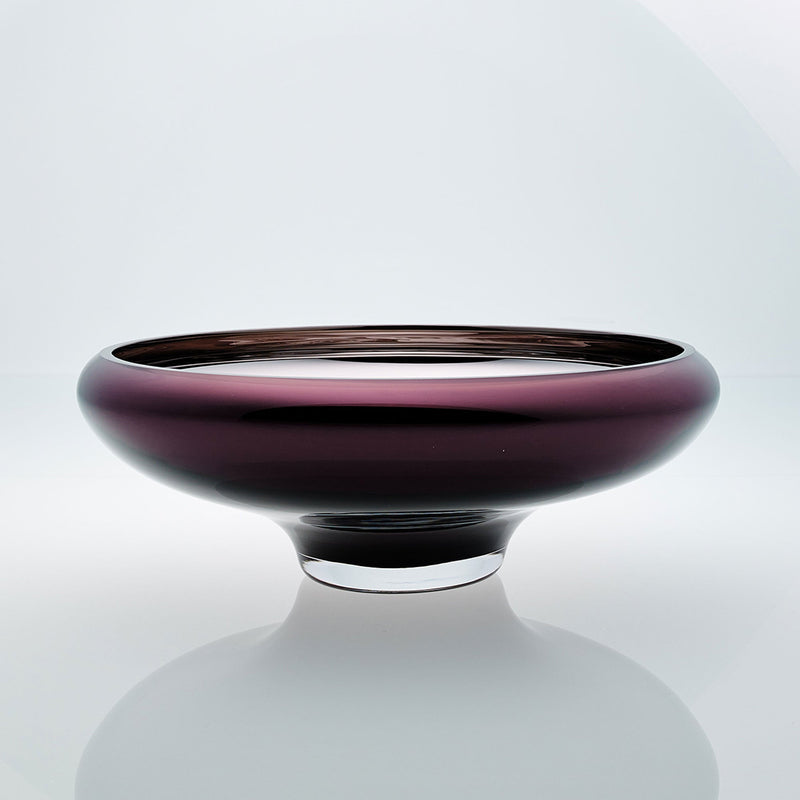 Purple glass bowl on a connected stand. Designer glass bowl with metal coating. Mirror effect glass bowl.