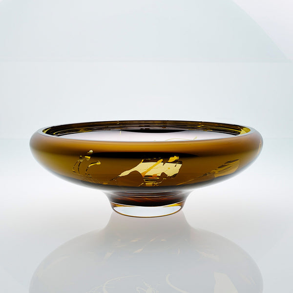 Amber glass bowl with splatter effect on a connected stand. Designer glass bowl with metal coating. Mirror effect glass bowl.