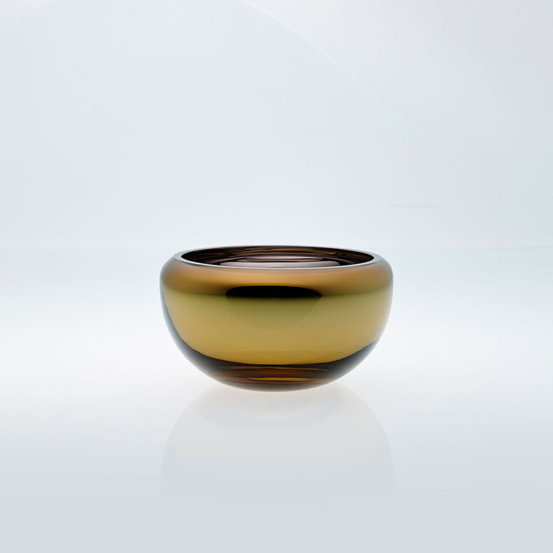 Small amber round glass bowl with interior metal coating. Mirror glass effect bowl.