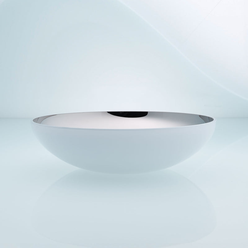 Flat round white glass fruit bowl with interior stainless steel coating. Mirror effect design glass bowl.